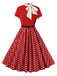 She slips into this 1950s Tie Neck Polka Dots Belted Dress and suddenly it's a 1950s daydream