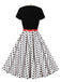 She slips into this 1950s Tie Neck Polka Dots Belted Dress and suddenly it's a 1950s daydream