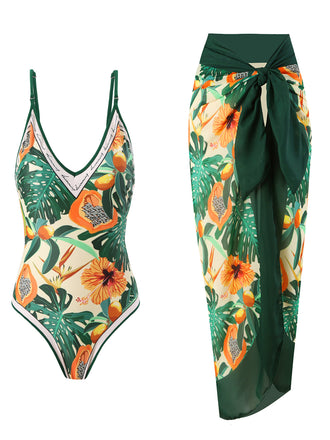 She's wearing 1950s Tropical Print One-Piece Swimsuit & Cover-Up and the whole beach remembers the 1950s