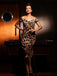 She slips into this 1960s Off-shoulder Leopard Pencil Dress and suddenly it's a 1960s daydream
