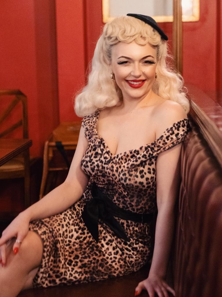 She slips into this 1960s Off-shoulder Leopard Pencil Dress and suddenly it's a 1960s daydream