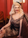 She slips into this 1960s Off-shoulder Leopard Pencil Dress and suddenly it's a 1960s daydream