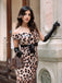 She slips into this 1960s Off-shoulder Leopard Pencil Dress and suddenly it's a 1960s daydream