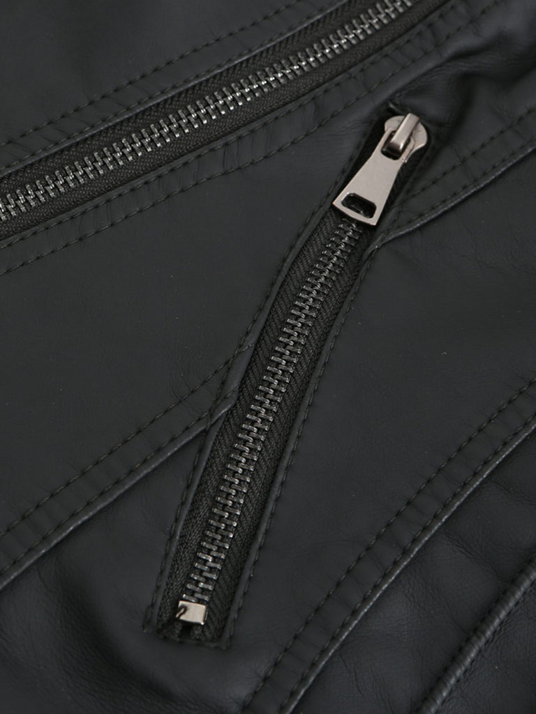 She throws on this 1960s Solid Faux Leather Motorcycle Jacket and the city feels like 1960s Paris