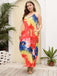 This 1960s Spaghetti Strap Floral Tulip Dress wraps her in 1960s elegance, one twirl at a time