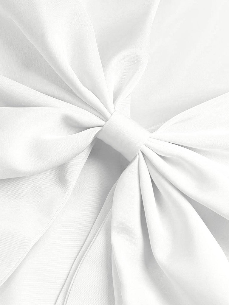 She slips into this 1960s Square Neck Back Bow Satin Dress and suddenly it's a 1960s daydream
