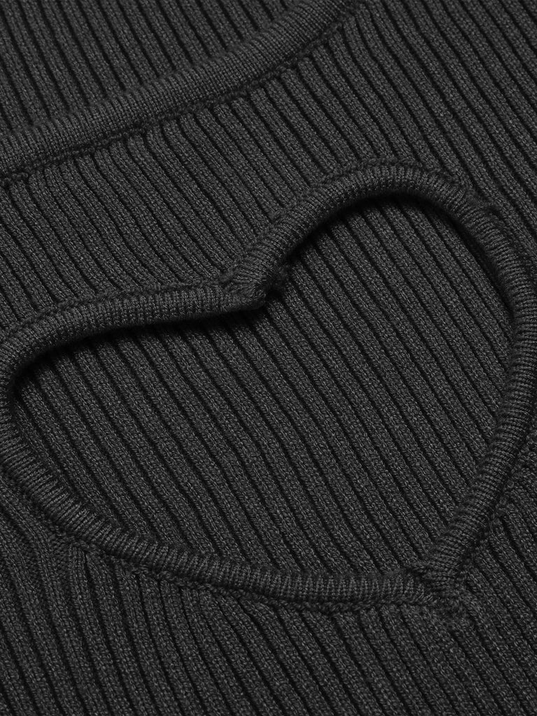 She finds her 1970s story in this 1970s Heart Cutout Knitted Solid Sweater