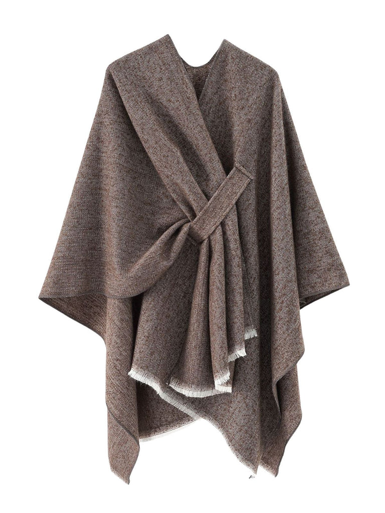 She adds this 1970s Raw Edge Solid Belted Poncho and suddenly it's 1970s perfection
