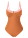 She's wearing 1980s Colorblock Strap High-Leg One-Piece Swimsuit and the whole beach remembers the 1980s
