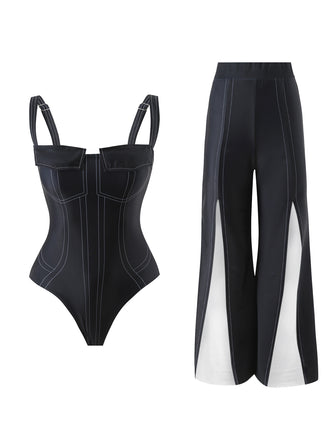 She's wearing 2PCS Black 1940s Gothic Straps Swimsuit & Pants and the whole beach remembers the 1940s