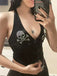 Black 1950s Punk Halter Rhinestone Skull Button Crop Top
