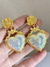 Alloy Rose Reflective Pleated Heart Earrings — vintage elegance in the palm of her hand