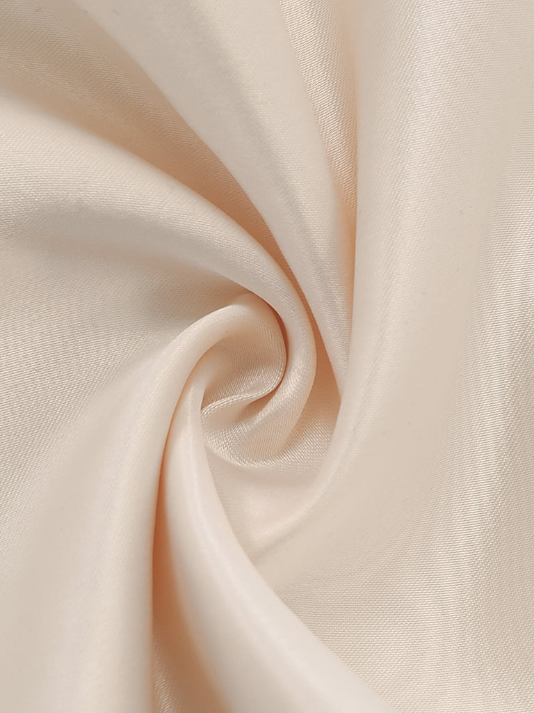 Close-up of beige fabric with a soft texture