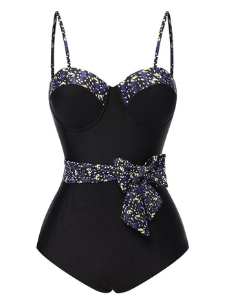 She's wearing Black 1930s Spaghetti Strap Polka Dots Bow Swimsuit and the whole beach remembers the 1930s