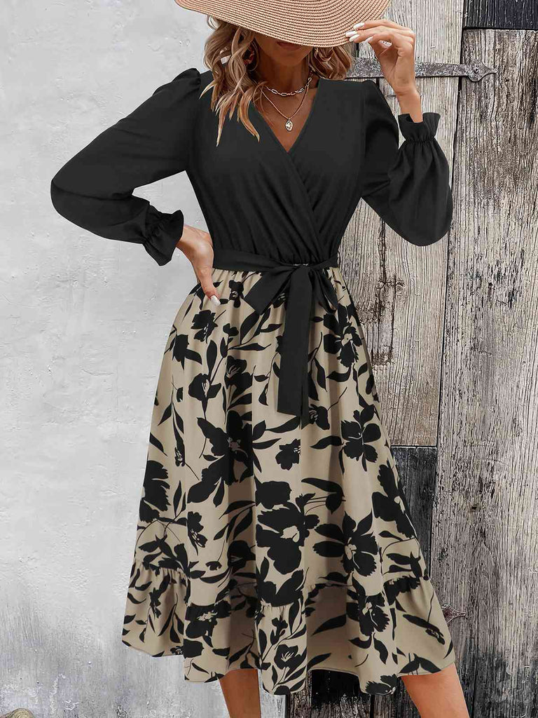 Black 1940s Floral Silhouette Long Sleeved Dress — the kind of 1940s dress that makes strangers smile
