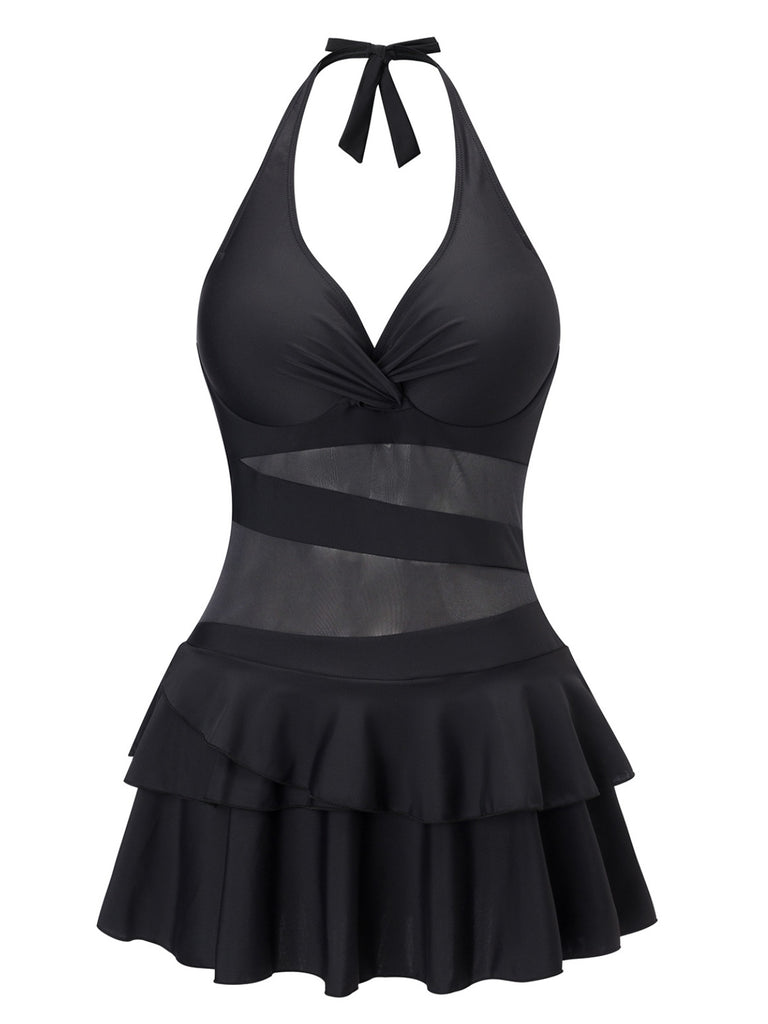 She slips into this Black 1940s Layered Hem Halter Swimdress and suddenly it's a 1940s daydream