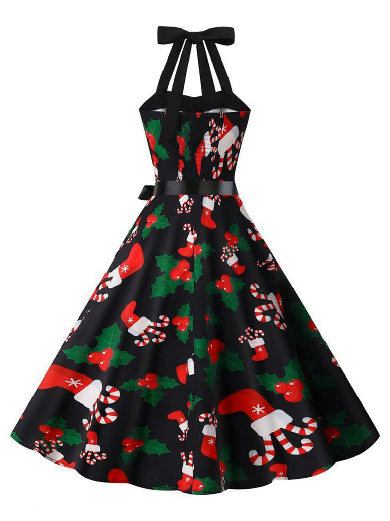This Black 1950s Christmas Santa Socks Halter Dress wraps her in 1950s elegance, one twirl at a time