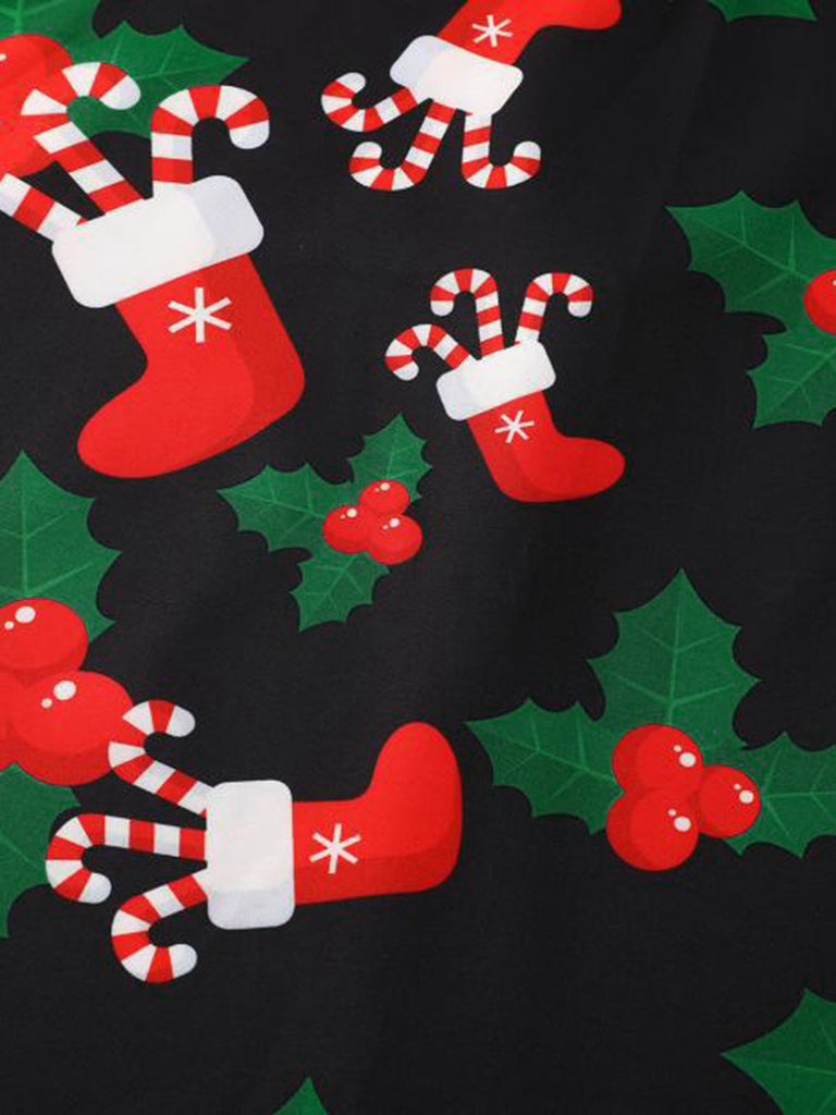 Black 1950s Christmas Santa Socks Halter Dress — the kind of 1950s dress that makes strangers smile