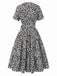 Black 1950s Ditsy Floral V-Neck Lace-Up Dress, vintage dress, retro fashion, rockabilly, pin-up fashion - perfect for women who love vintage and retro fashion