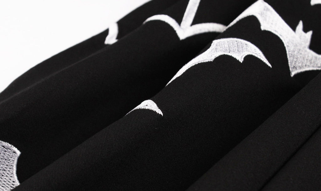This Black 1950s Halloween Bat Collar Embroidered Dress wraps her in 1950s elegance, one twirl at a time