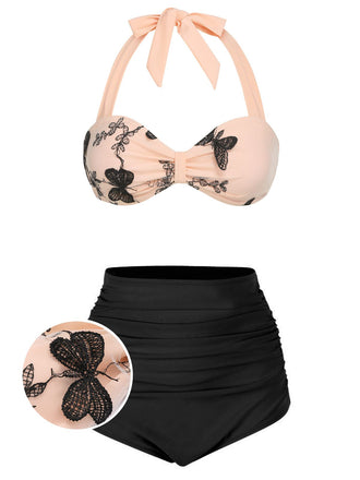 Front view: 1950s Black 1950s Halter Butterfly Swimsuit, perfect for vintage themed parties and retro fashion enthusiasts