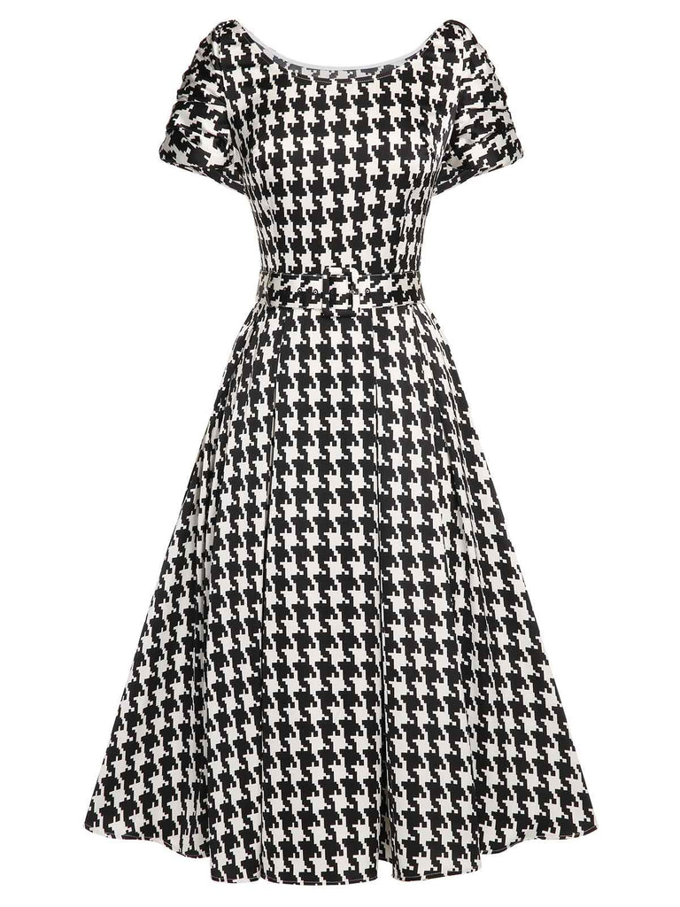 Black 1950s Houndstooth Short Sleeve Belted Dress — vintage elegance for the modern woman