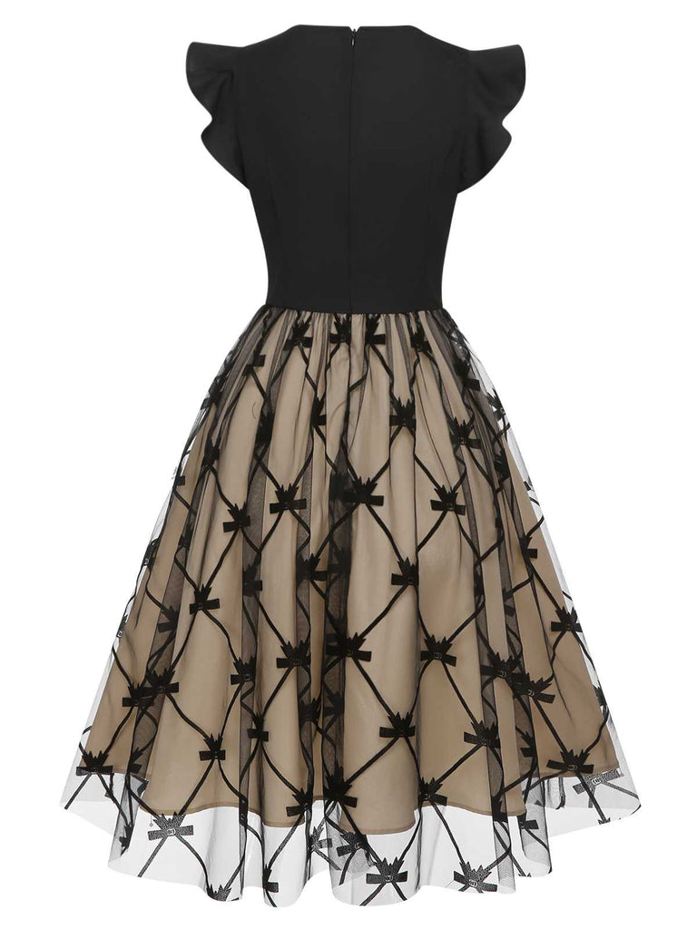 Black 1950s V-Neck Bow Mesh Dress — the kind of 1950s dress that makes strangers smile