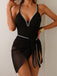 She's wearing Black 1960s Jagged Edges Swimsuit & Sheer Cover-Up and the whole beach remembers the 1960s