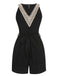 She adds this Black 1960s V-Neck Belted Romper and suddenly it's 1960s perfection