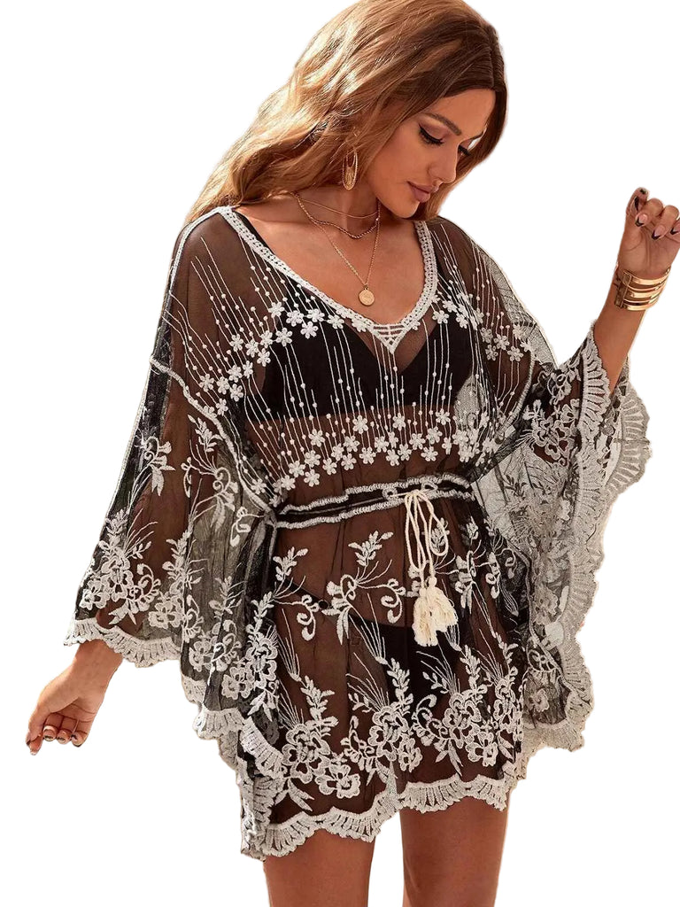 She finds her 1970s story in this Black 1970s Embroidered Mesh Cover-Up