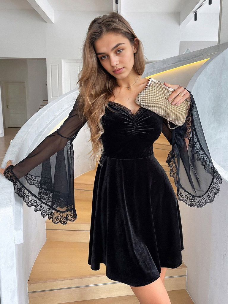 Black 1970s Halloween Lace Bat Sleeves Dress — the kind of 1970s dress that makes strangers smile