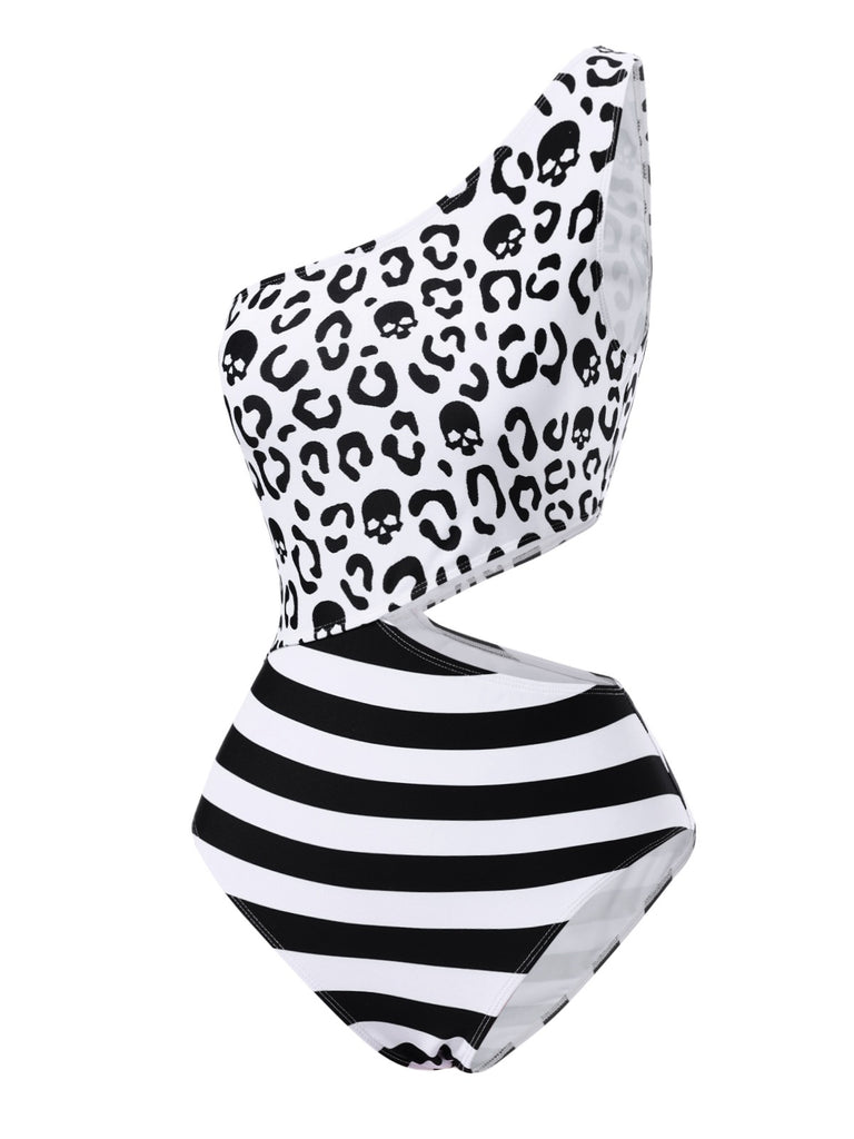This Black 1980s One-Shoulder Hollow Skull Stripe Swimsuit carries 1980s vacation dreams in every stitch