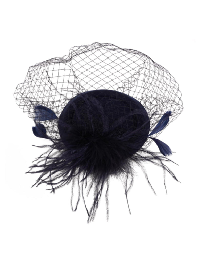 She adds this Black Faux Feather Fascinator Hat With Veil and suddenly it's vintage perfection
