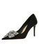 She finds her vintage story in this Black Rhinestone Satin Pointed Toe Stiletto Heels