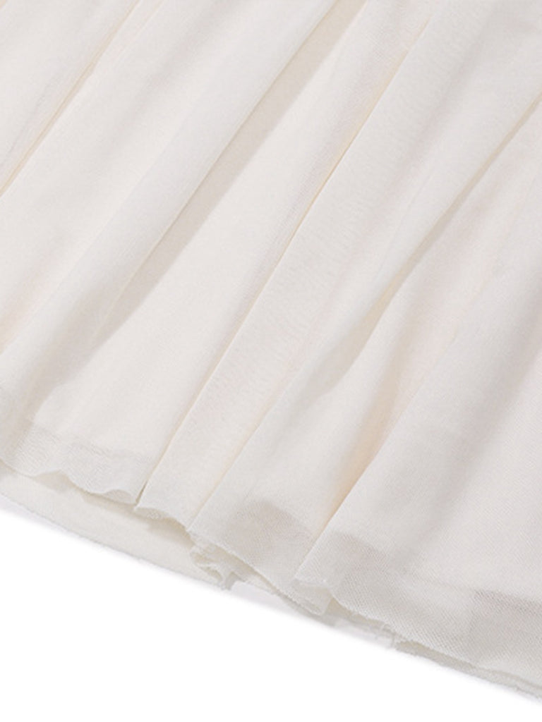 Black & White 1950s Off-Shoulder Skater Dress — the kind of 1950s dress that makes strangers smile