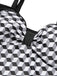 This Black & White 1960s Geometric Lace-Up Swimsuit carries 1960s vacation dreams in every stitch