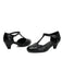 Pair of black ballroom dancing shoes on a white background