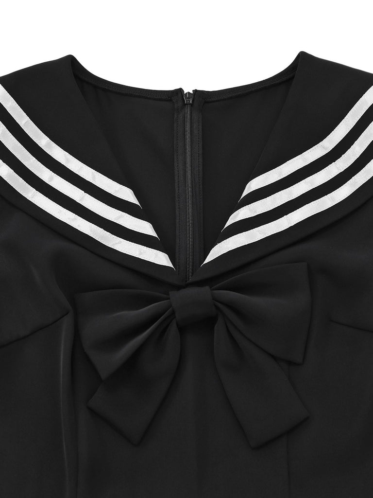 Black dress with white stripes and a bow detail on a white background