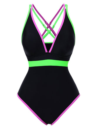 Black swimsuit with neon green and pink accents on a white background