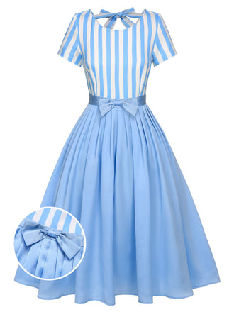 She slips into this Blue 1940s Boat Neck Stripes Bow Dress and suddenly it's a 1940s daydream