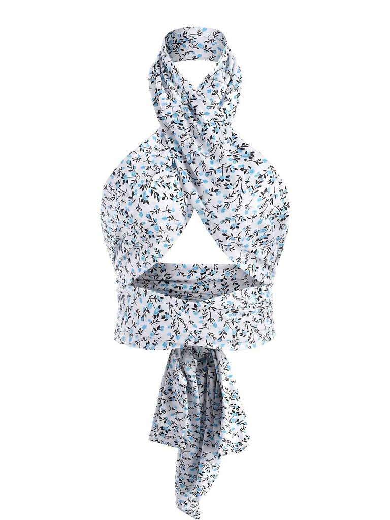 She pairs this Blue 1950s Ditsy Floral Lace-Up Crop Camisole with confidence and 1950s charm