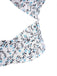 This Blue 1950s Ditsy Floral Lace-Up Crop Camisole brings 1950s soul to her everyday