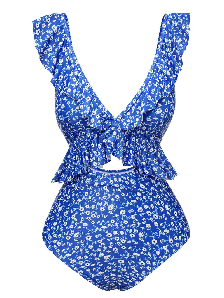 She's wearing Blue 1950s Floral Ruffles One-Piece Swimsuit and the whole beach remembers the 1950s