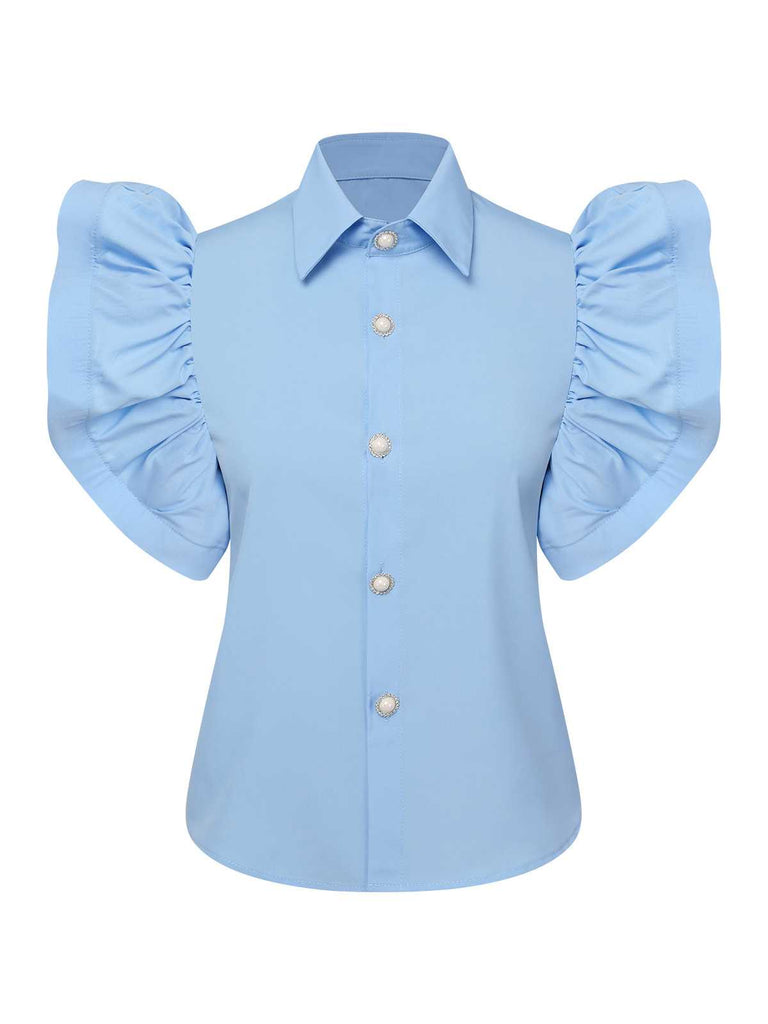She pairs this Blue 1950s Lapel Ruffles Sleeve Solid Blouse with confidence and 1950s charm