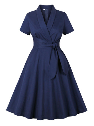 She slips into this Blue 1950s Lapel Waist-Tie Cotton Dress and suddenly it's a 1950s daydream
