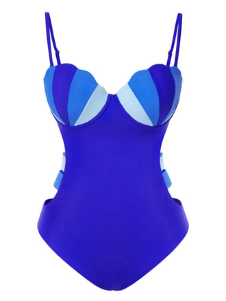 She's wearing Blue 1950s Seashell Hollow One-Piece Swimsuit and the whole beach remembers the 1950s
