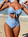 She's wearing Blue 1950s Spaghetti Straps Hollow Floral Swimsuit and the whole beach remembers the 1950s