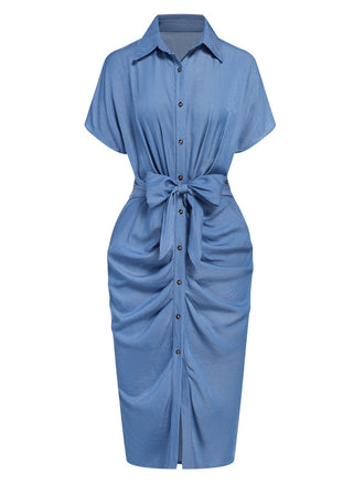 She slips into this Blue 1960s Batwing Tencel Denim Shirt Dress and suddenly it's a 1960s daydream