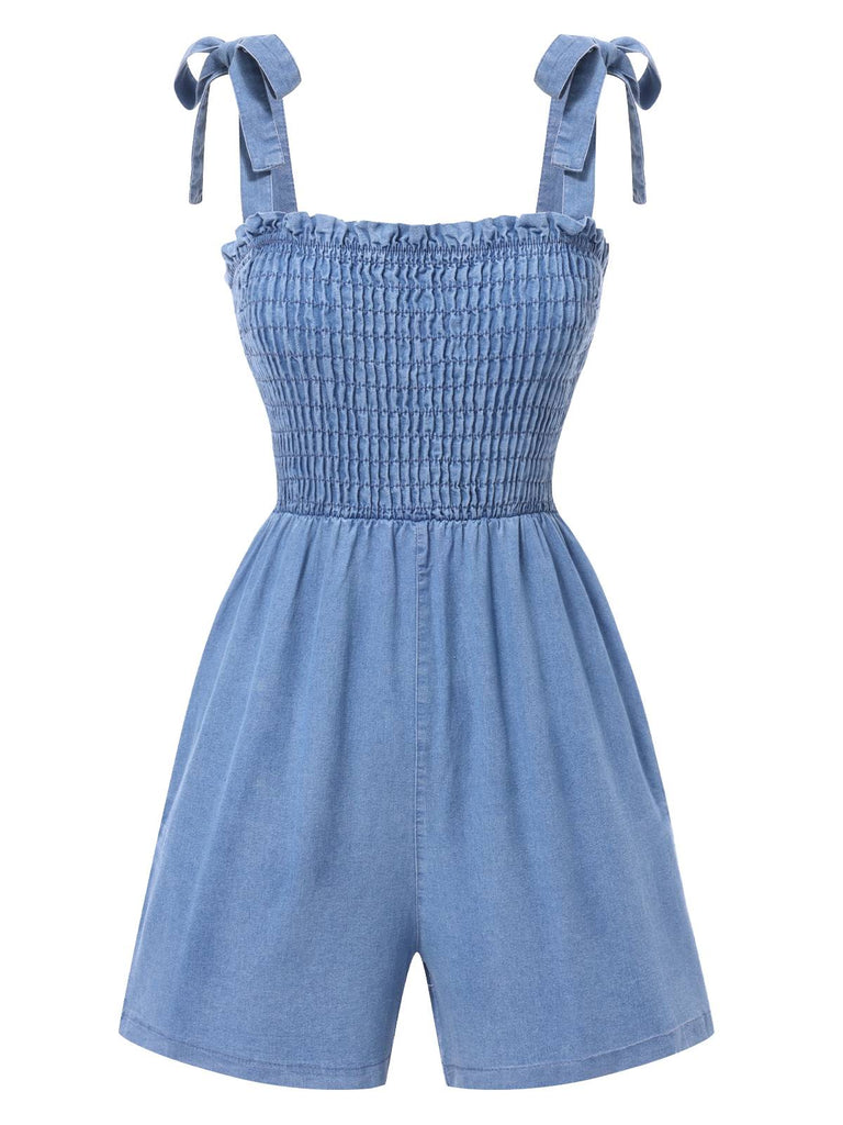 She finds her 1960s story in this Blue 1960s Shoulder Tie Smocked Denim Romper