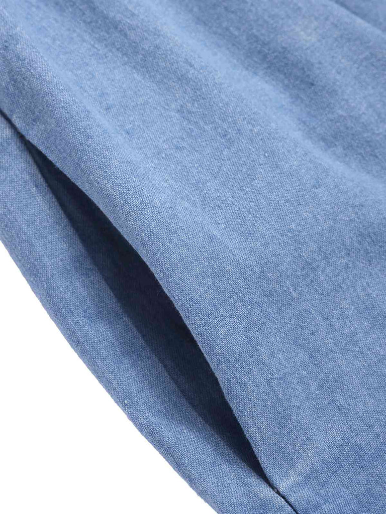 This Blue 1960s Shoulder Tie Smocked Denim Romper whispers 1960s secrets to those who notice